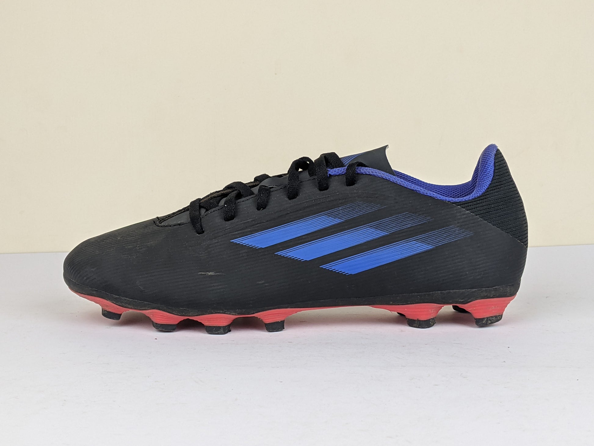 adidas X Speedflow .4 FG Edge of Darkness - Core Black/Sonic Ink/Solar Yellow