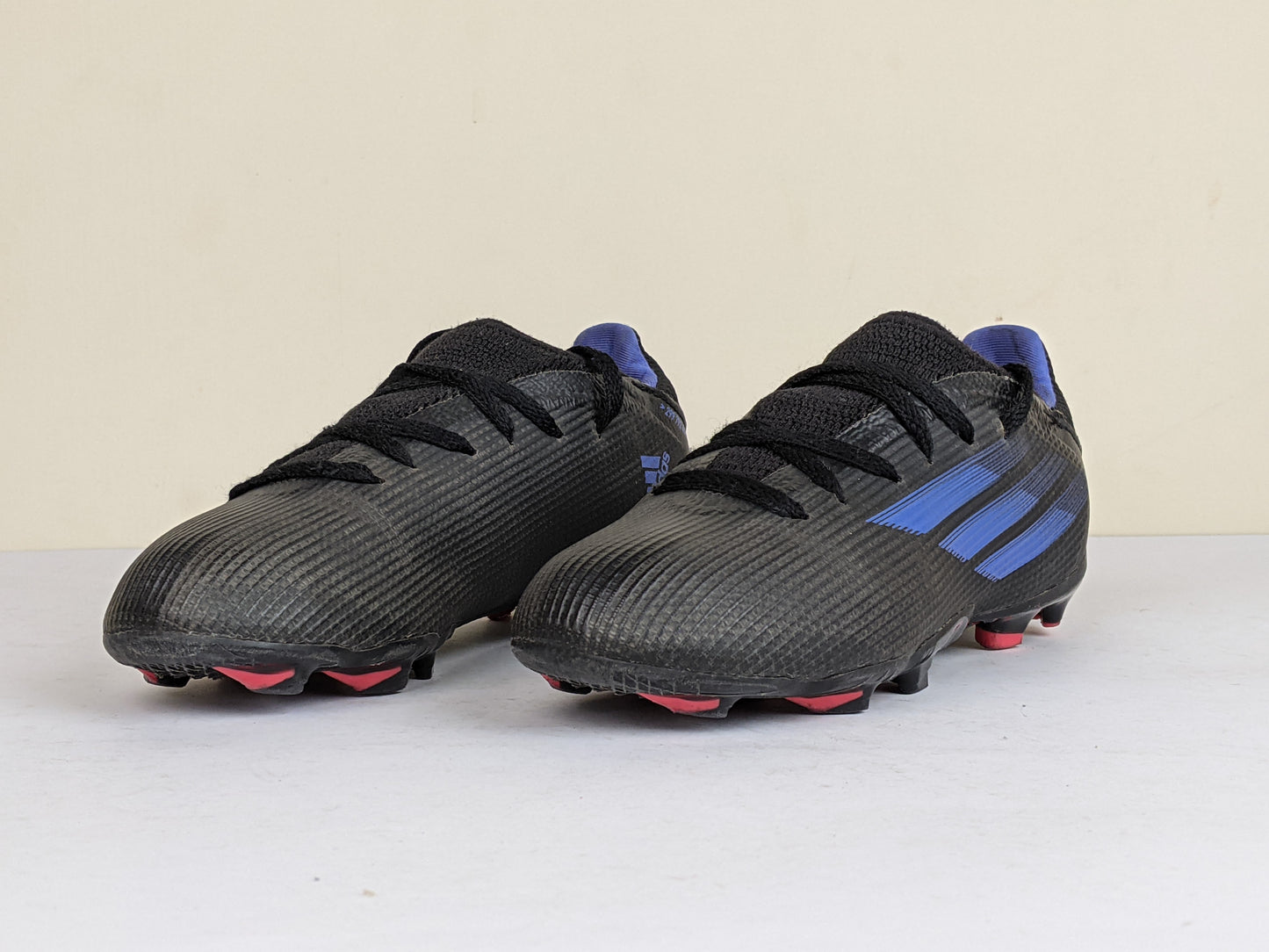 adidas X Speedflow .3 FG Edge of Darkness - Core Black/Sonic Ink/Solar Yellow Kids