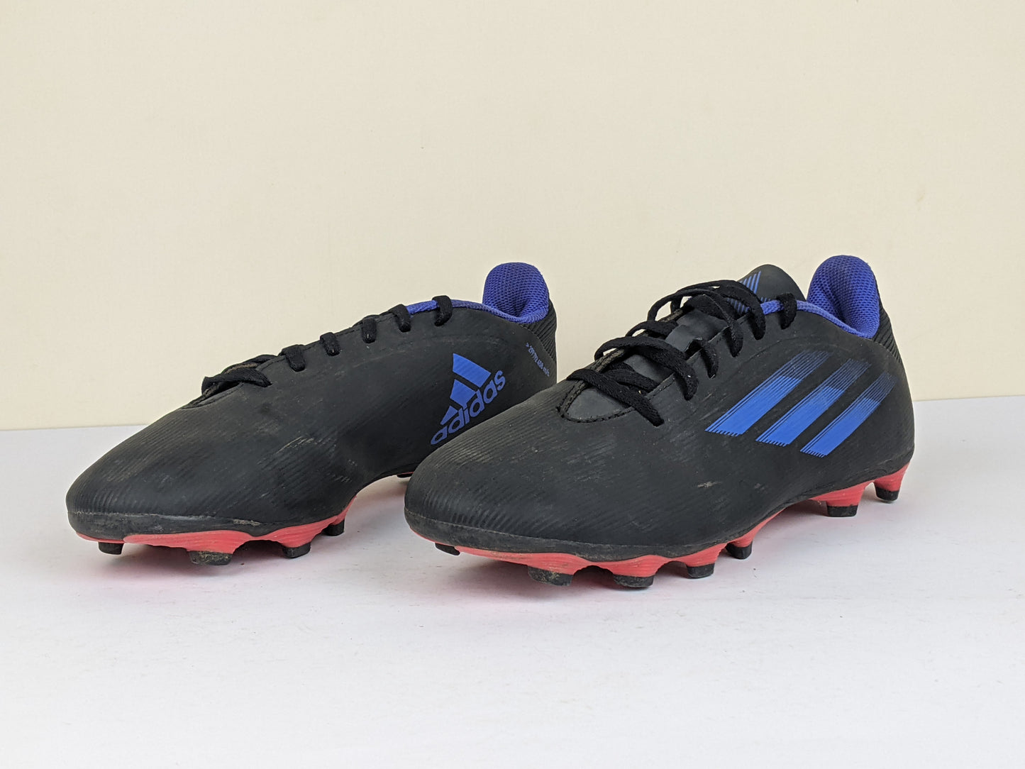 adidas X Speedflow .4 FG Edge of Darkness - Core Black/Sonic Ink/Solar Yellow